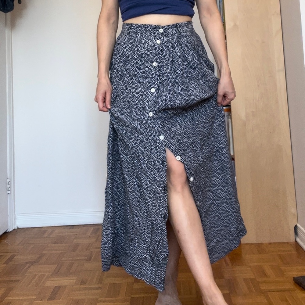 Long skirt with buttons on the front and slits on the sides